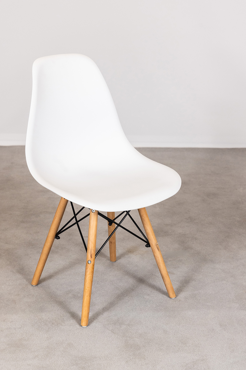 White chair with wooden legs